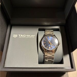 TAG HEUER CARRERA
DATE blue/gold/Silver 
Automatic, 36 mm, Steel
WBN2311.BA0001
